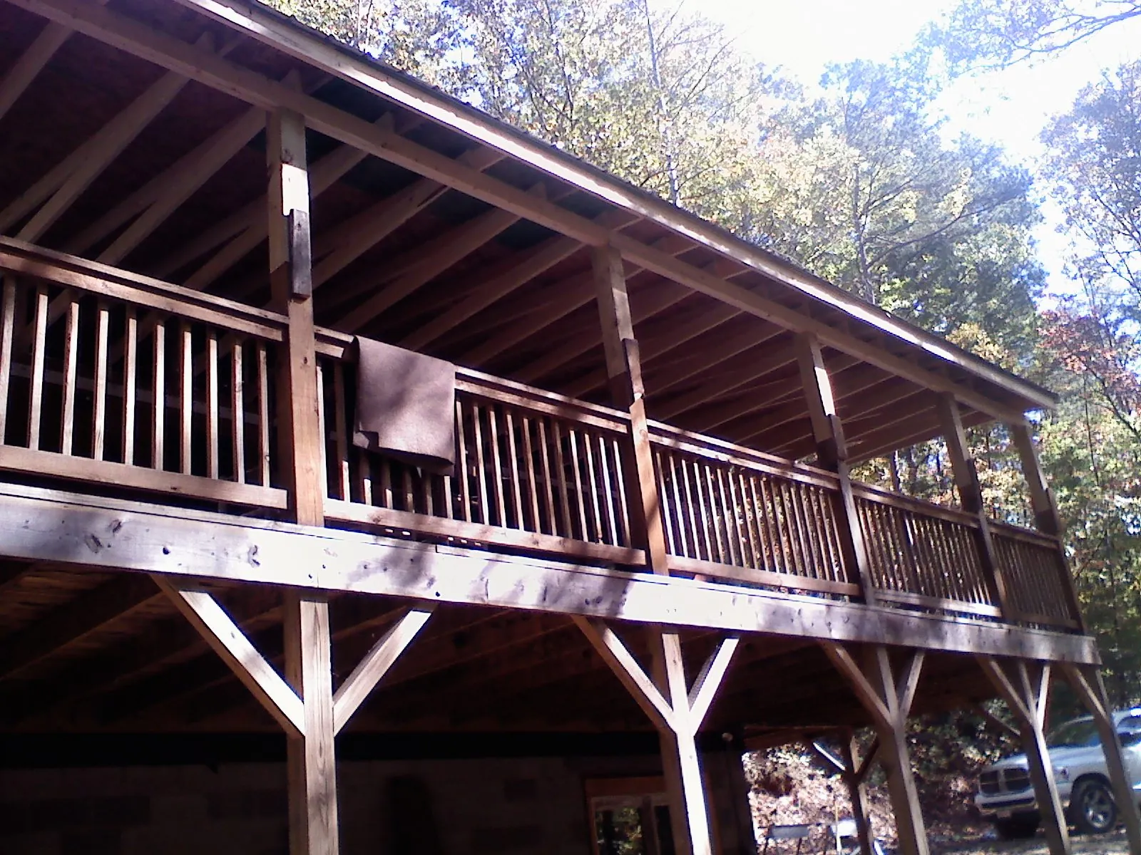 Timber framing under a new elevated porch and deck — Roof Leak Repair in Wiggins by Roofing Brothers